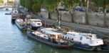 1 Barges On The River Seine Banks In Paris